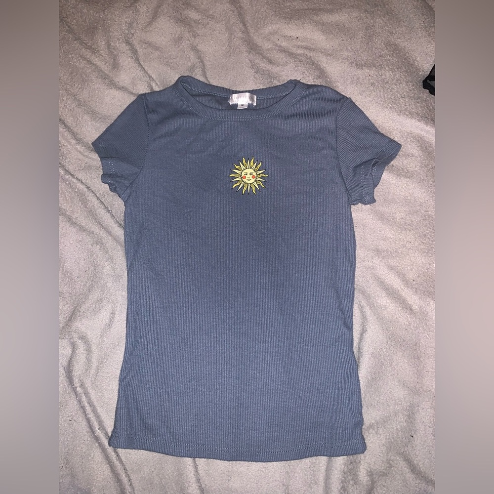 grayish blue sun shirt, size small, never worn, orange kiss.